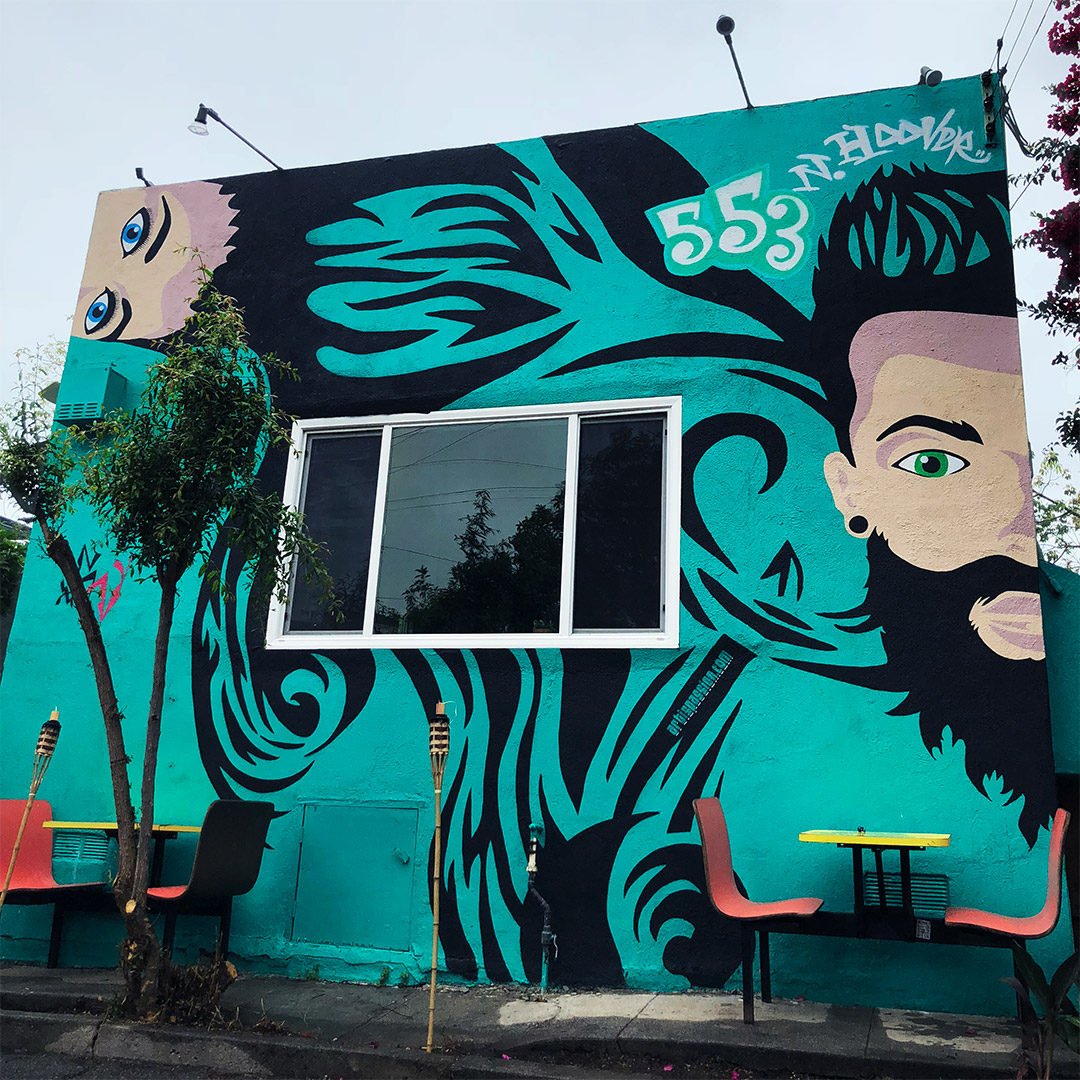 beauty studio exterior mural attracting foot traffic